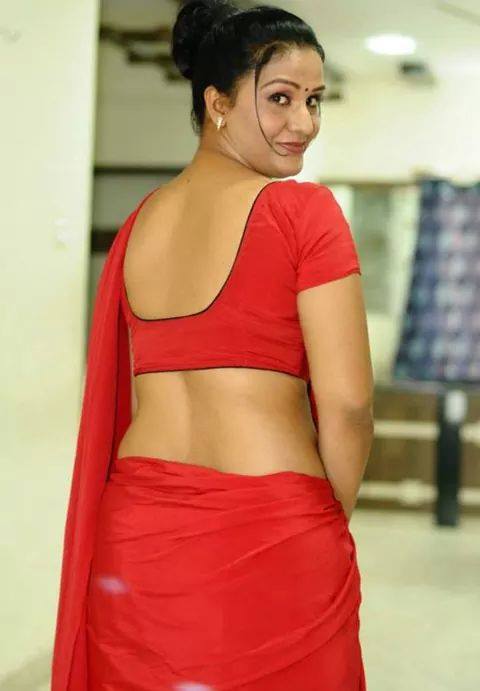 Indian Mallu Aunty Hot Pose Wearing Red Saree and Showing Navel - 1